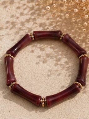 Burgundy Bead Stretch Bracelet with Gold Accents